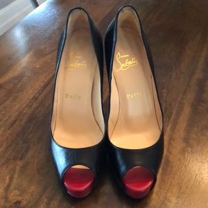 Louboutin black leather pumps